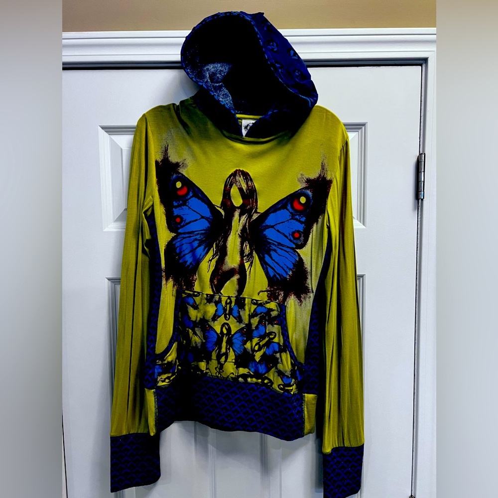 Nuvula (specialty boutique) unique butterfly girl hoodie. Pockets in the front.